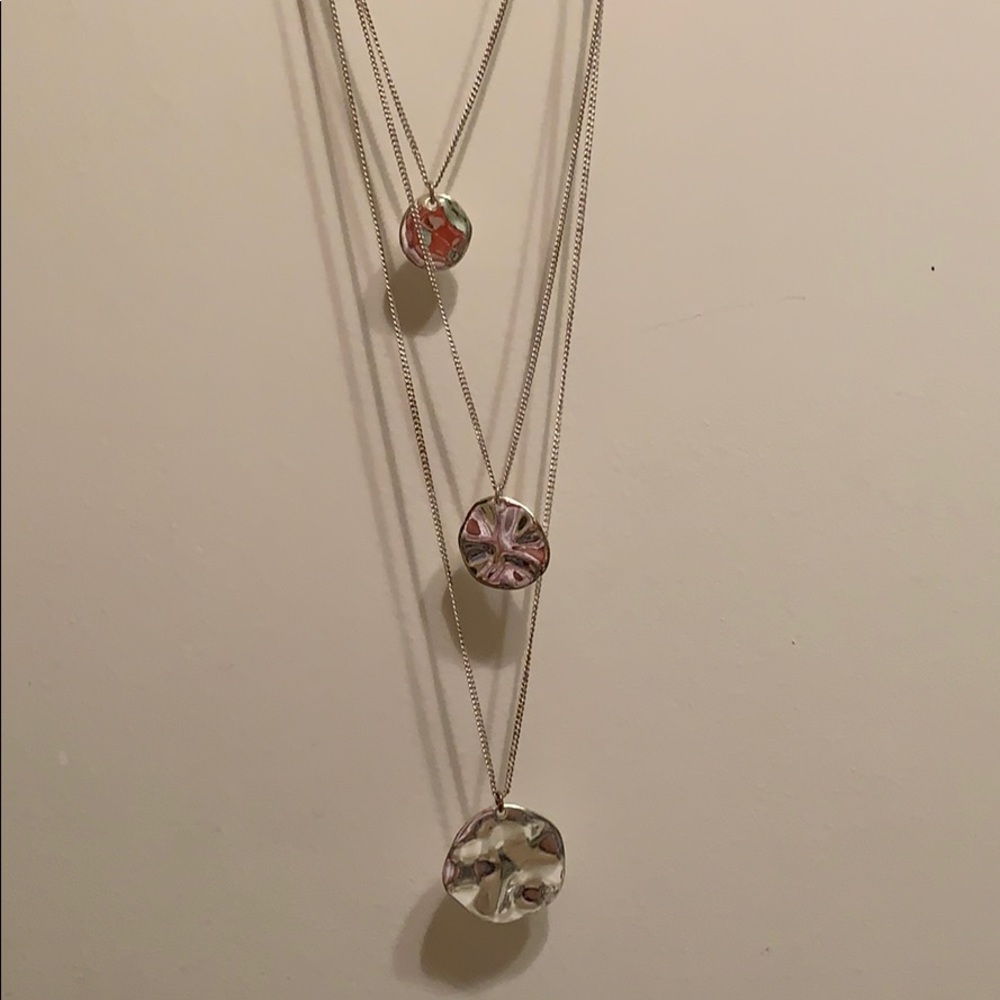 USED. Triple disc silver layered necklace.